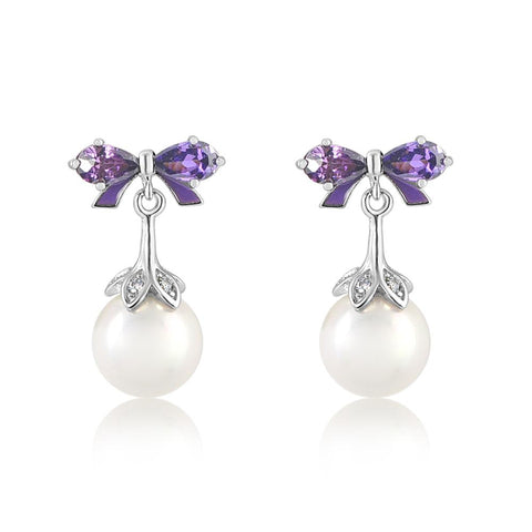Buy this stunning girl’s white pearl earring from Chanteur